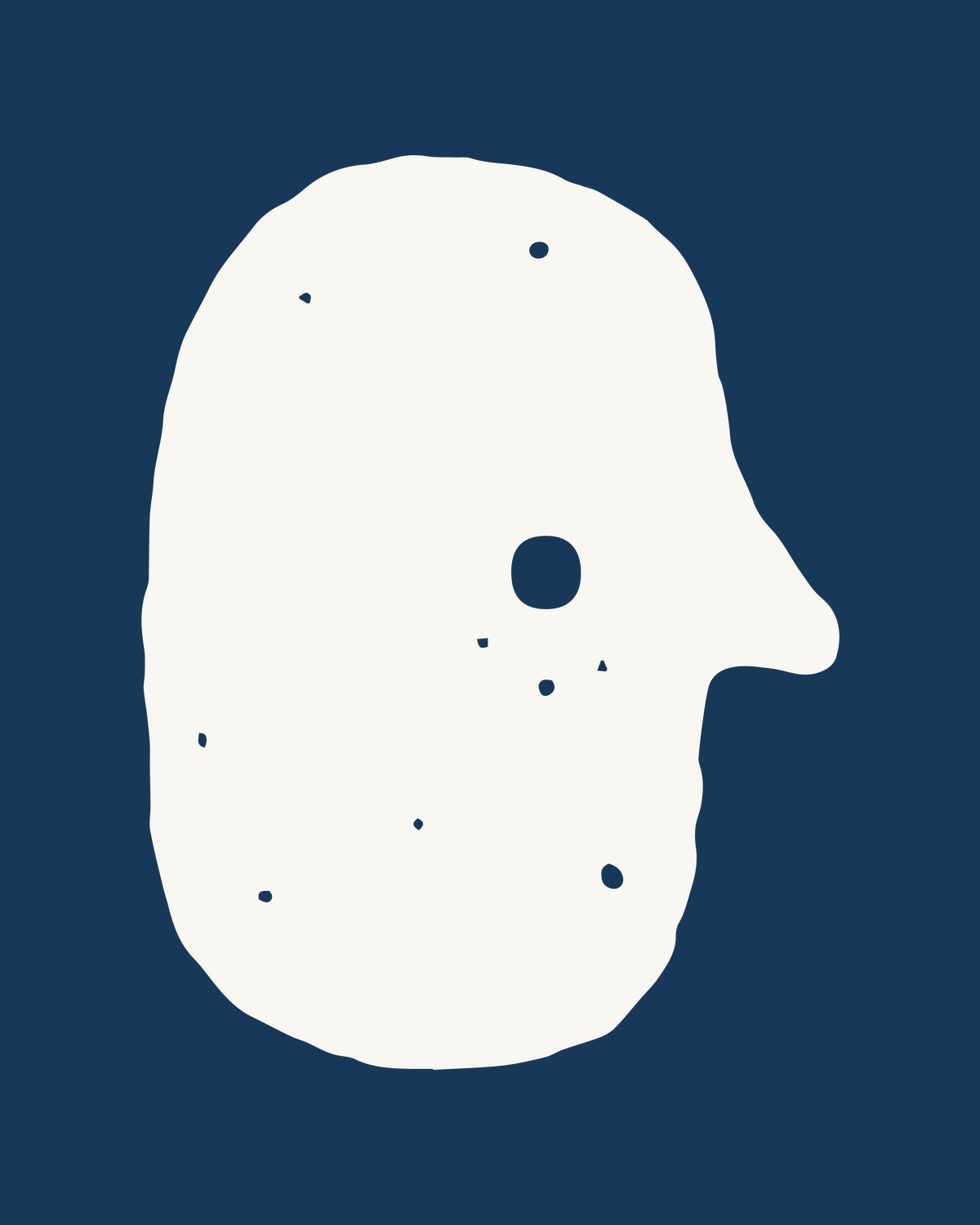 La cabeza de perfil en negativo, calada en beige sobre el azul marino de la marca